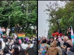 Tangkapan-layar-aksi-pengibaran-bendera-pelangi-simbol-LBGT-di-area-Monas.jpg