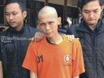 Tersangka-RPS-tengah-berkaus-oranye.jpg