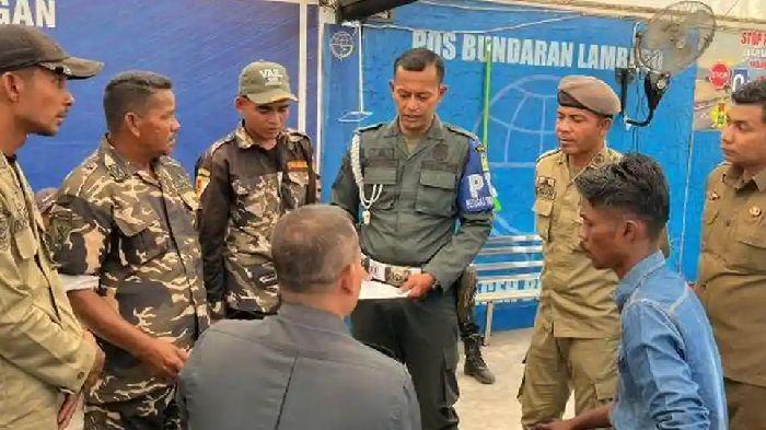 satpol-PP-dan-WH-Aceh-Besar-bubarkan-aksi-penggalangan-dana-tanpa-izin-di-Bundaran-Lambaro.jpg