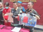 AE-seorang-ASN-di-Kota-Pasuruan-diamankan-setelah-ditetapkan-menjadi-tersangka.jpg