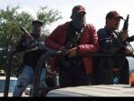 Anggota-kelompok-bela-diri-sipil-di-Meksiko-berjanji-akan-membantu-polisi-melawan-kartel-narkoba.jpg