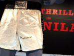 Celana-tinju-yang-dikenakan-Muhammad-Ali-dalam-duel-legendaris-Thrilla-in-Manilla.jpg