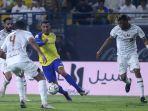 Cristiano-Ronaldo-dikawal-tiga-pemain-lawan-dalam-pertandingan-Al-Shabab-vs-Al-Nassr.jpg