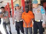 Husson-Mukhtar-Bin-Saber-Ahmad-saat-dibawa-personel-Polres-Pidie.jpg