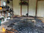Lantai-gubuk-yang-menjadi-tempat-tinggal-korban-hangus-terbakar.jpg