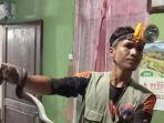 NGERI-Ular-Piton-Masuk-Rumah-Warga-Aceh-Timur-Sembunyi-di-Bawah-Lemari.jpg