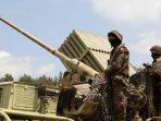Pejuang-Hizbullah-di-Atas-Tank-Militer.jpg