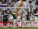 Pemain-Real-Madrid-Merayakan-Kemenangan.jpg