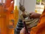 Seorang-pria-di-Thailand-terjatuh-dan-dadanya-tertusuk-kepala-patung-Buddha-kecil.jpg