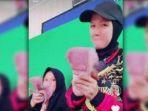Tangkapan-layar-aksi-istri-Kapolres-Tebing-Tinggi-pamer-uang-di-media-sosial-TikTok.jpg