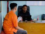 Tersangka-Penyebar-Video-Bugil-Mantan-Istri-Saat-Diperiksa-Polisi.jpg