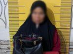 Tersangka-Taibah-bersama-BB-sabu-sabu-seberat-36020-gram-diamankan-di-Mapolres-Langsa.jpg