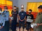 Tiga-terduga-TI-FS-dan-HN-saat-diamankan-petugas-di-Rutan-Benteng-Sigli.jpg