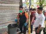 Tim-Inafis-melakukan-olah-TKP-kasus-penemuan-mayat-pria-dab-wanita-dalam-sebuah-mobil.jpg