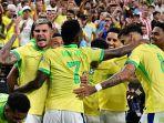 Vinicius-Junior-melakukan-selebrasi-bersama-rekan-setimnya-dalam-laga-Grup-D-Copa-America-2024.jpg
