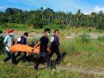 pmi-melakukan-evakuasi-jasad-manusia-di-aliran-krueng-aceh-kawasan-desa-leupung-balu.jpg