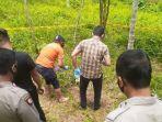 polisi-saat-berada-di-lokasi-temuan-tengkorak-manusia-tanpa-identitas-di-area-kebun-karet.jpg