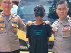 tersangka-MS-bersama-BB-mobil-dum-truk-yang-ia-curinya.jpg