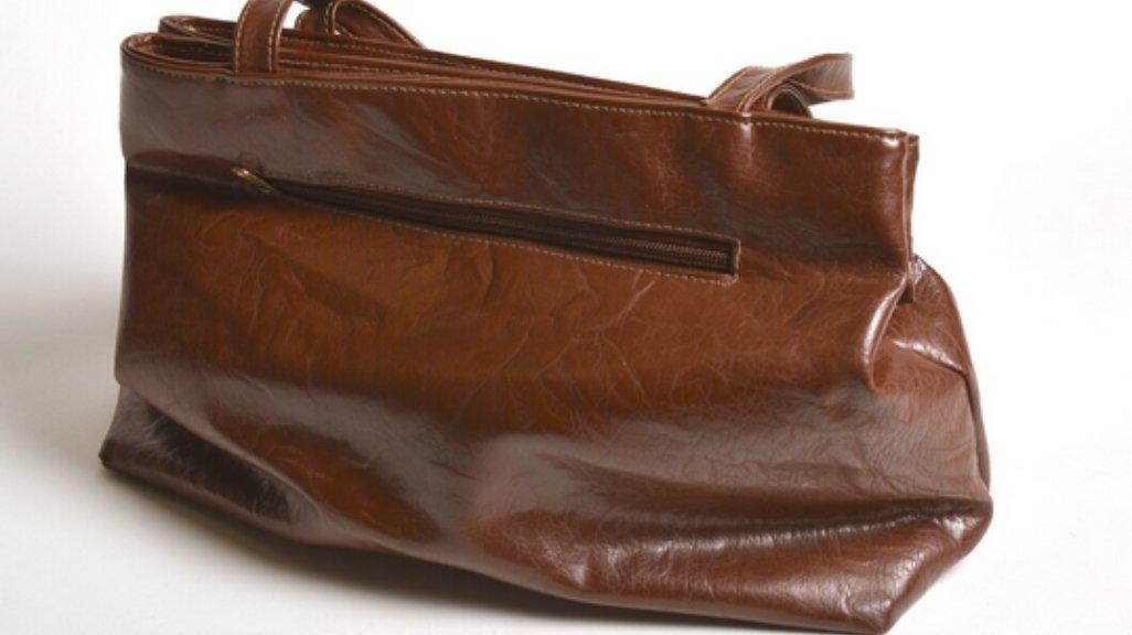 Ilustrasi tas kulit.
