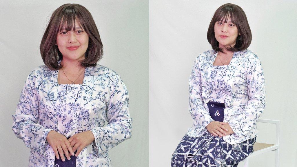 Kebaya Kutubaru Putih lengan panjang motif Bunga Biru dari Batik Saraswati Solo.