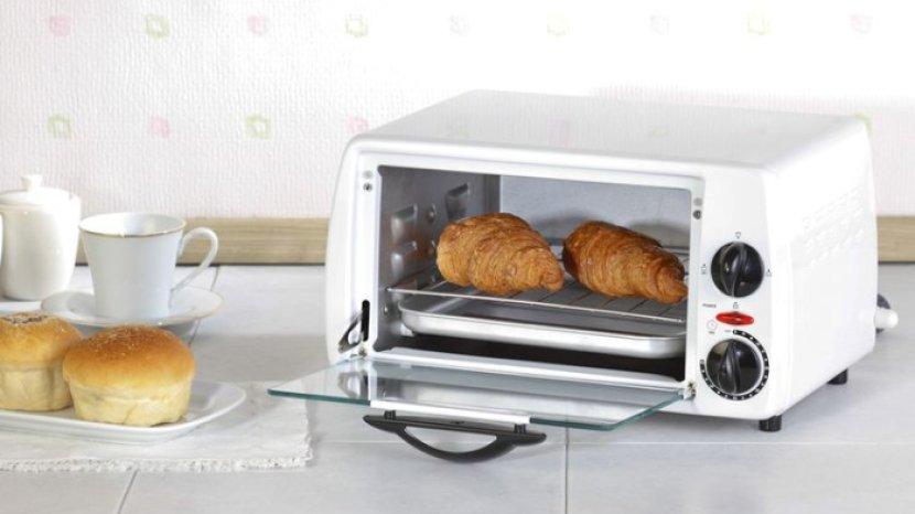 ilustrasi-penggunaan-oven-listrik-mungil-untuk-dapur-minimalis.jpg