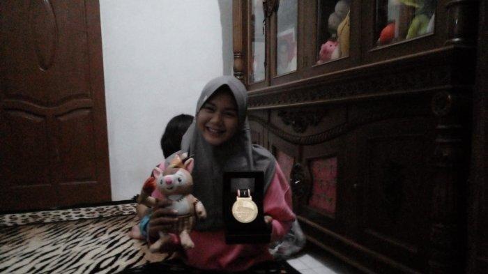 Viral Peraih Medali Emas PON Papua Pulang Naik Bus Umum, Ternyata Ingin Beri Kejutan ke Keluarga