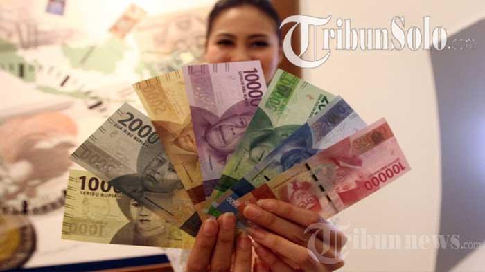 Ilustrasi-Penampakan-uang-baru-yang-masih-mulus-diburu-m.jpg