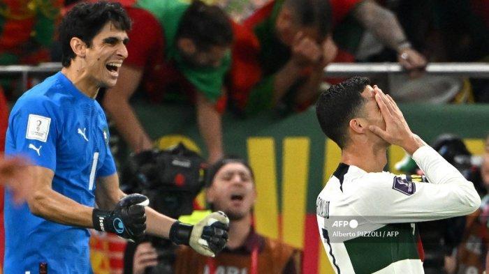 solo/Penyerang-Portugal-Cristiano-Ronaldo-bereaksi-di-samping-kiper-Maroko-Yassine-Bounou.jpg