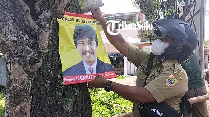 Satpol-PP-Kabupaten-Sragen-mencopot-poster-bergambar-Ketua-DPD.jpg