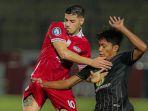 Alexis-Messidoro-dan-Reza-Zuhro-beraksi-dalam-laga-Persis-Solo-vs-PS-Barito-Putera.jpg