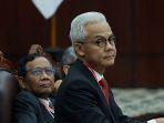 Ganjar-Pranowo-dan-Mahfud-MD-menghadiri-sidang-perdana.jpg