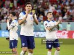 Harry-Maguire-dan-Kieran-Trippier-merayakan-kemenangan.jpg