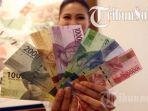Ilustrasi-Penampakan-uang-baru-yang-masih-mulus-diburu-m.jpg