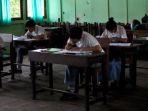 Ilustrasi-siswa-SMA-sedang-mengerjakan-ujian.jpg