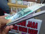 Jasa-penukaran-uang-di-Kota-Solo-menjelang-Lebaran.jpg