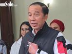 Jokowi-pakai-jaket-baru-psi-di-solo.jpg