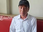 solo/Jokowi-pakai-topi.jpg