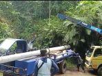 PLN-memasang-listrik-di-Dusun-Sawangan-Desa-Tlogopakis.jpg