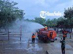 Penyemprotan-disinfektan-di-Pasar-Hewan-Pracimantoro.jpg