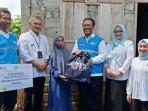 Penyerahan-simbolis-bantuan-penyalaan-listrik-gratis-dan-paket-sembako.jpg