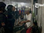 Pria-lanjut-usia-berinisial-T-diamankan-polisi.jpg
