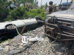Proses-Evakuasi-mobil-Sigra-warna-putih-tertabrak-KA-Batara-Kresna.jpg