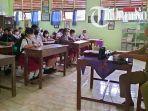 Siswa-memakai-masker-di-hari-pertama-pe-sragen.jpg