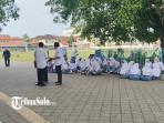 Siswa-siswi-SMKN-3-Solo-tengah-bersiap-di-Alun-alun-Kidul-Keraton-Solo-Rabu-5112025.jpg