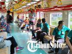 Suasana-Kereta-Rel-Listrik-KRL-jalur-Stasiun-Solo-Balapan.jpg