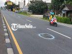 Tanda-Putih-di-lubang-jalan-raya-Solo-Semarang.jpg