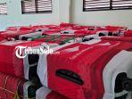 Tumpukan-koper-JCH-di-Embarkasi-Solo-usai-diturunkan-dari-boks-truk-Senin-2252023.jpg