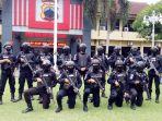 ilustrasi-tim-sparta-polresta-solo-yang-siap-menum.jpg
