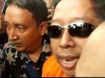 romahurmuziy-atau-rommy-usai-ditetapkan-sebagai-tersangka.jpg