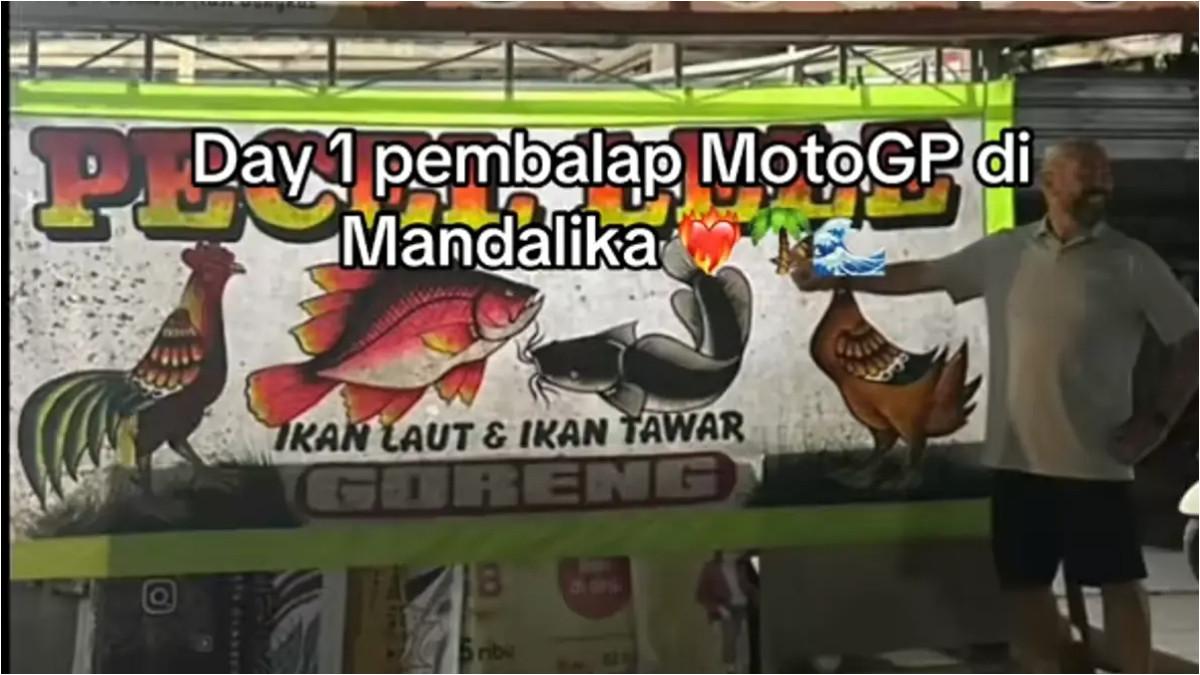 PEMBALAP MOTOGP MERAKYAT - David Munoz juga tak mau ketinggalan merasakan kehidupan lokal.
